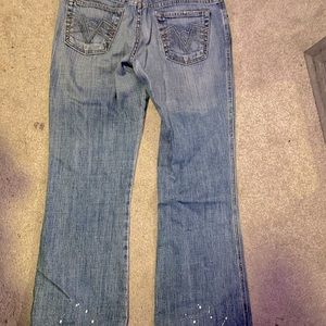 Machine brand jeans with styled bleach splatter!